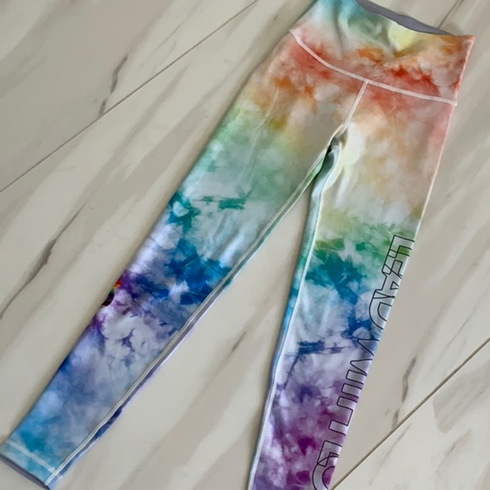 Peloton brand-new lead with love leggings.  With tags on.